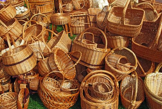 Various handmade baskets for sale at a souvenir market in Russia.