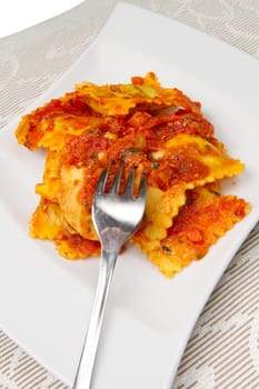 italian ravioli with red tomaotes sauce