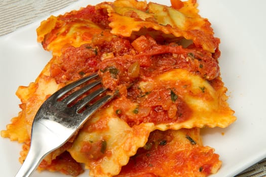 italian ravioli with red tomaotes sauce