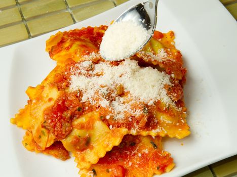 italian ravioli with red tomaotes sauce