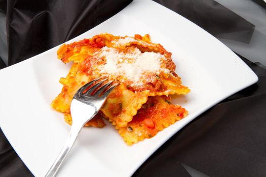 italian ravioli with red tomaotes sauce