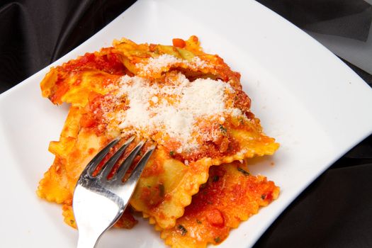 italian ravioli with red tomaotes sauce