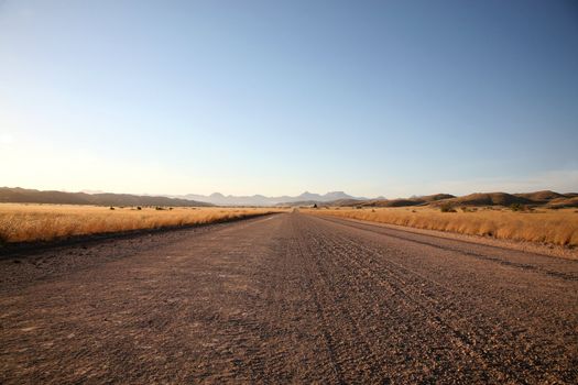 Gravel road in the region of Brandberg in Namibia