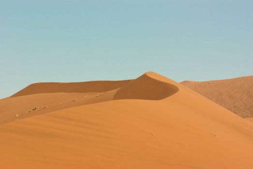 Incredible huge dunes of sand located in Sossusvlei in Namibia within the Namid desert