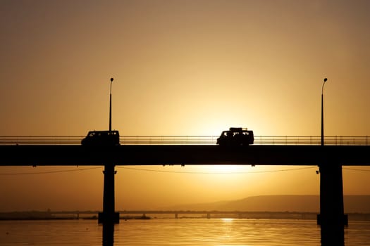 Pont des martyrs Bridge in Bamako - on the river the Niger with a beautiful sunset with people, cars