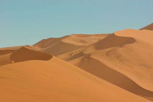 Incredible huge dunes of sand located in Sossusvlei in Namibia within the Namid desert