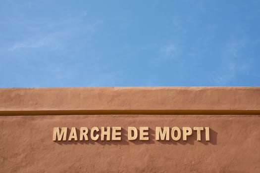 Entrance to the market of Mopti in Mali with a blue sky