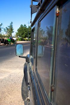 Car waiting in the center of Marrakesh in Morocco with blue sky