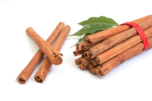 Sticks of cinnamon on white backround