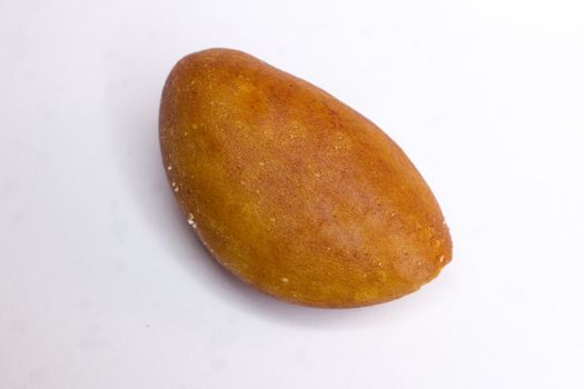 A close-up of a salted Brazil nut.