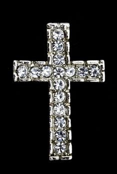 Beautiful diamond cross necklace isolated on black background 