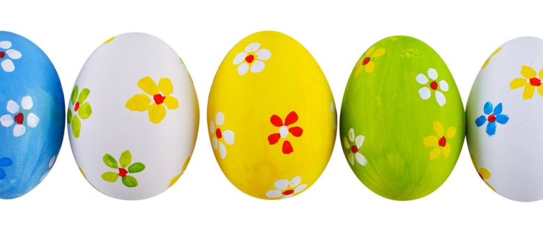 Hand painted green, white, yellow easter eggs isolate