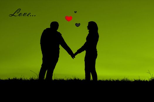 loving couple holding hands on a green background