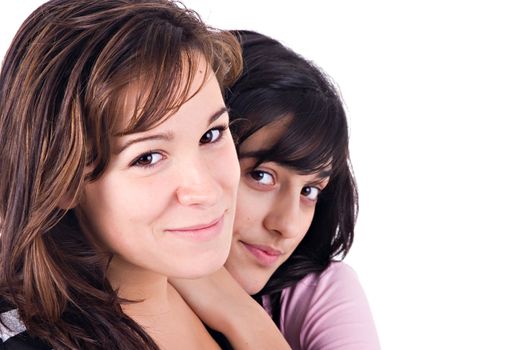 Two girls portrait with copy space, over white background.