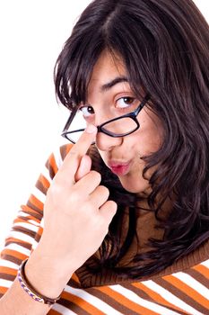 Girl wearing glasses with cute silly expression.