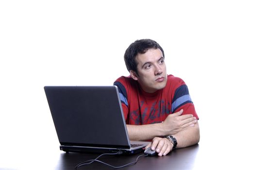 young man wondering and working with is laptop