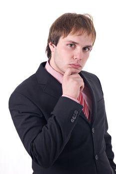 Young businessman thinking. Isolated on white background.