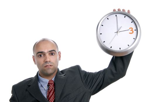 A handsome business man holding a clock