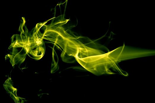 abstract colored smoke in a black background