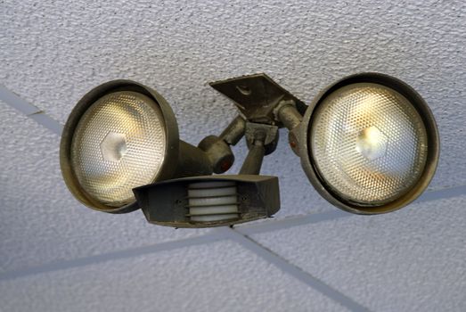 Motion sensor light mounted on a building wall