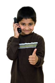An handsome kid showing thumbs up - concept of success