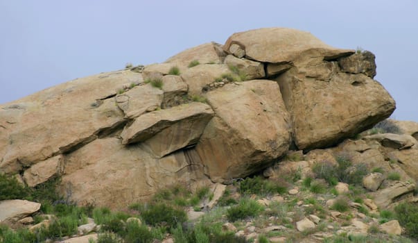 The rock formation on the right looks like a side shot of a head.