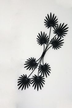 Decorative wall hanging on a white background wall