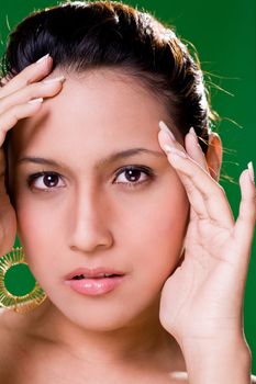 facial close up of a beautiful eurasian woman smile with cup hands