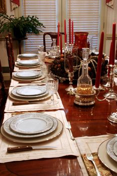 Formal dining table in home set for holiday dinner