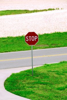 Stop sign on a local road with copyspace at the top