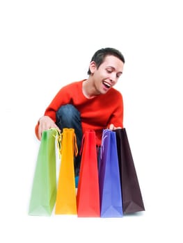 Young man holding shopping bags