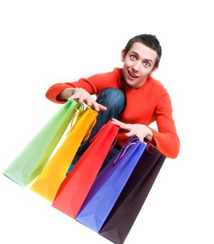 Young man holding shopping bags