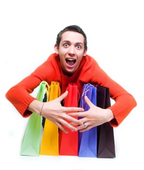 Young man holding shopping bags