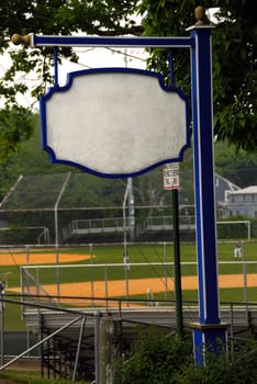 an empty signboard on a base ball field - ready for your text