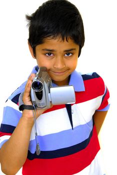 An handsome Indian kid holding a video camera