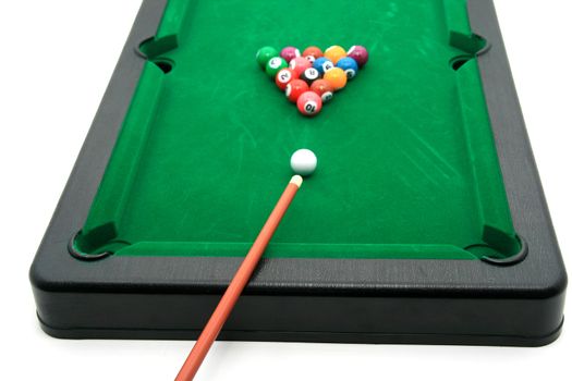 snooker table and balls over white background (focus on the club)