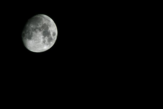 the moon with black background (space for publicity)