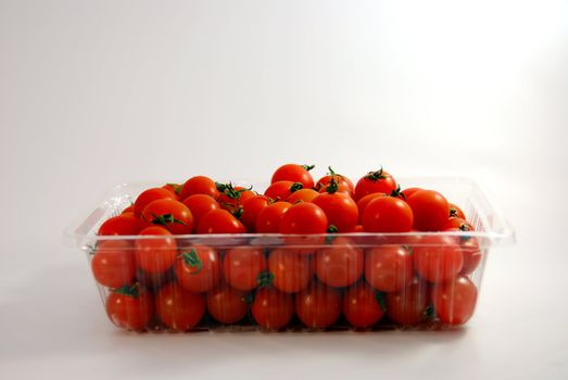 Cherry Tomatoes in A Clear Plastic Punnet.