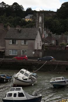 some fishing boats anchored in the bay