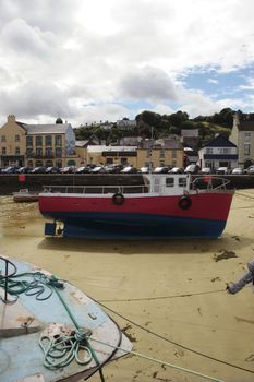 some fishing boats anchored in the bay