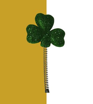 cutout of a coiled shamrock