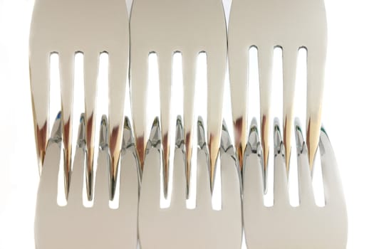Set of forks on white background