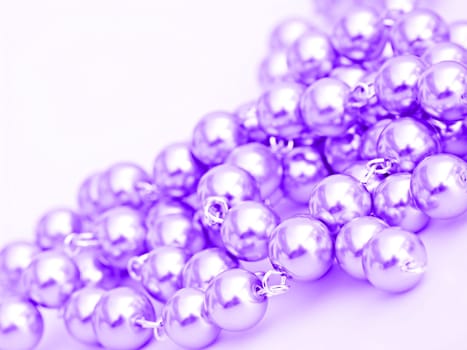 A completely purple pearl necklace.
