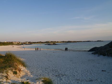 beach in evening with few people