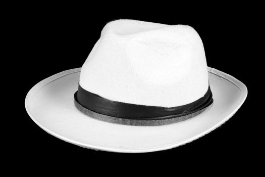 A white fedora hat, isolated on black studio background.