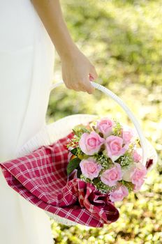 Outdoor bride holding her bouquet