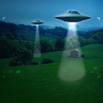UFO in a meadow early in the morning