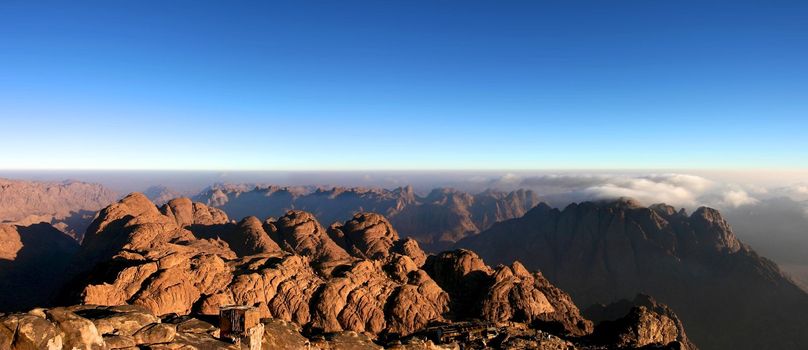 Two shadows in the Mont Sinai in Egypt early in the morning with sunrise