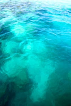 Detail of the Indian Ocean in the Maldives, blue sky and crystal water