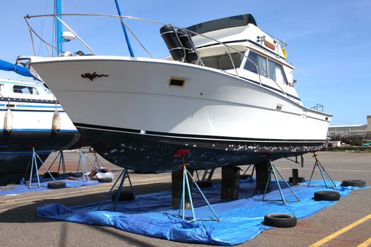 Boat on stands to be serviced and repaired.